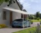 A blue Tesla is covered by a White Faria 13 ft. x 20 ft. lean-to carport