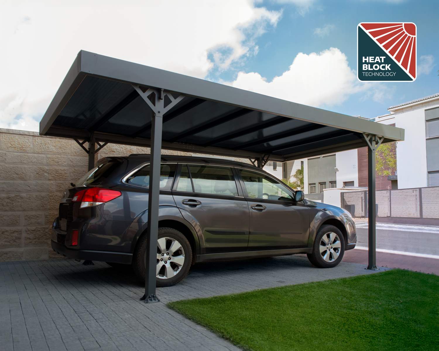Grey 10ft x 16ft Palma aluminum carport with a flat roof and clear panels, near a modern home and greenery
