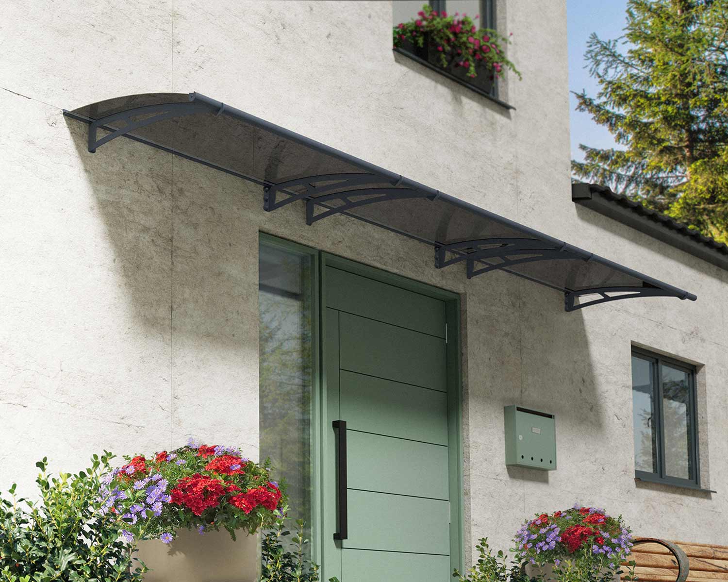 Grey Aquila door awning, measuring 3 ft x 15 ft, featuring a solar grey roof, adding style to a modern entryway