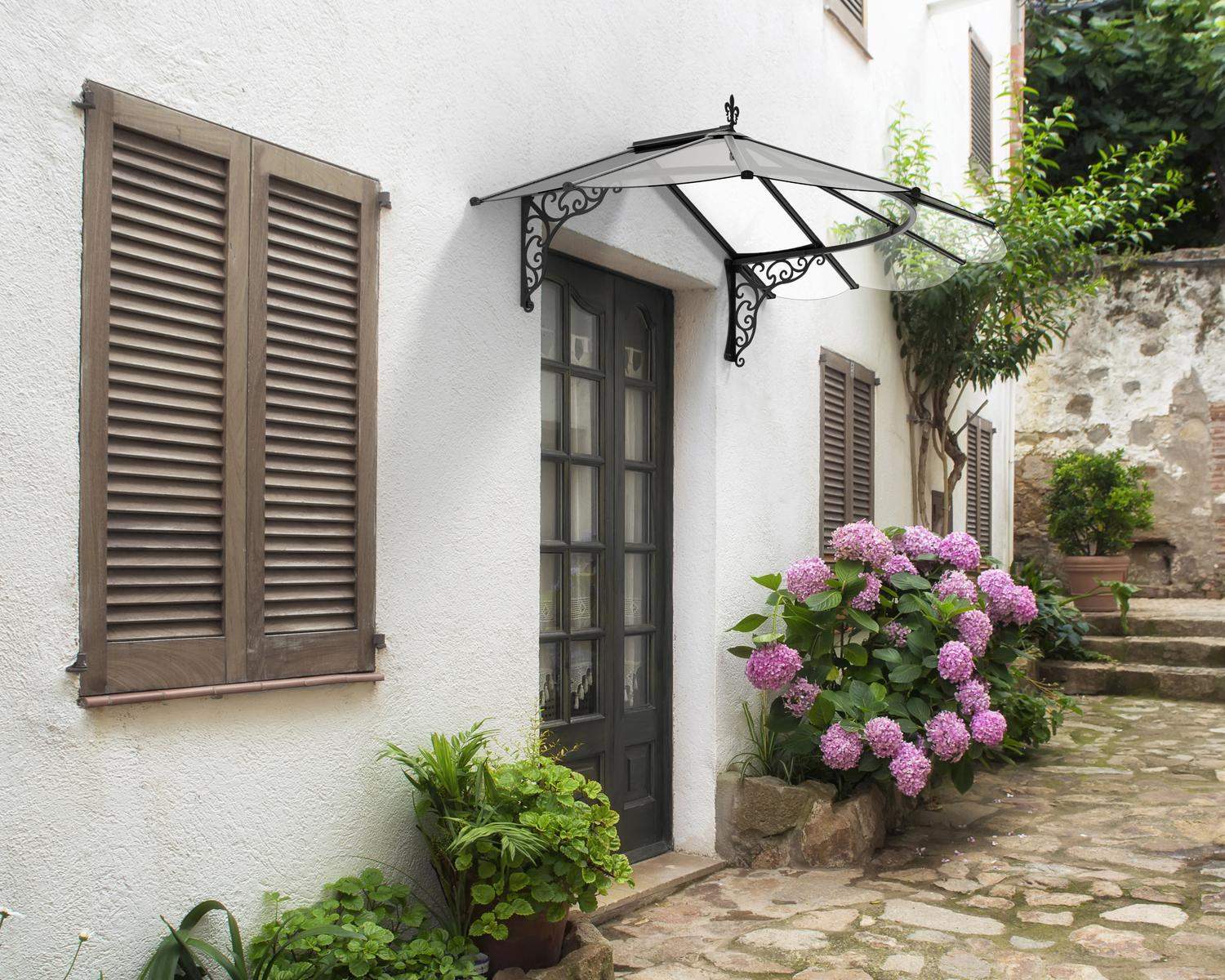 Sleek black Iris door awning 4 ft x 6 ft featuring clear panels, stylishly positioned above a door