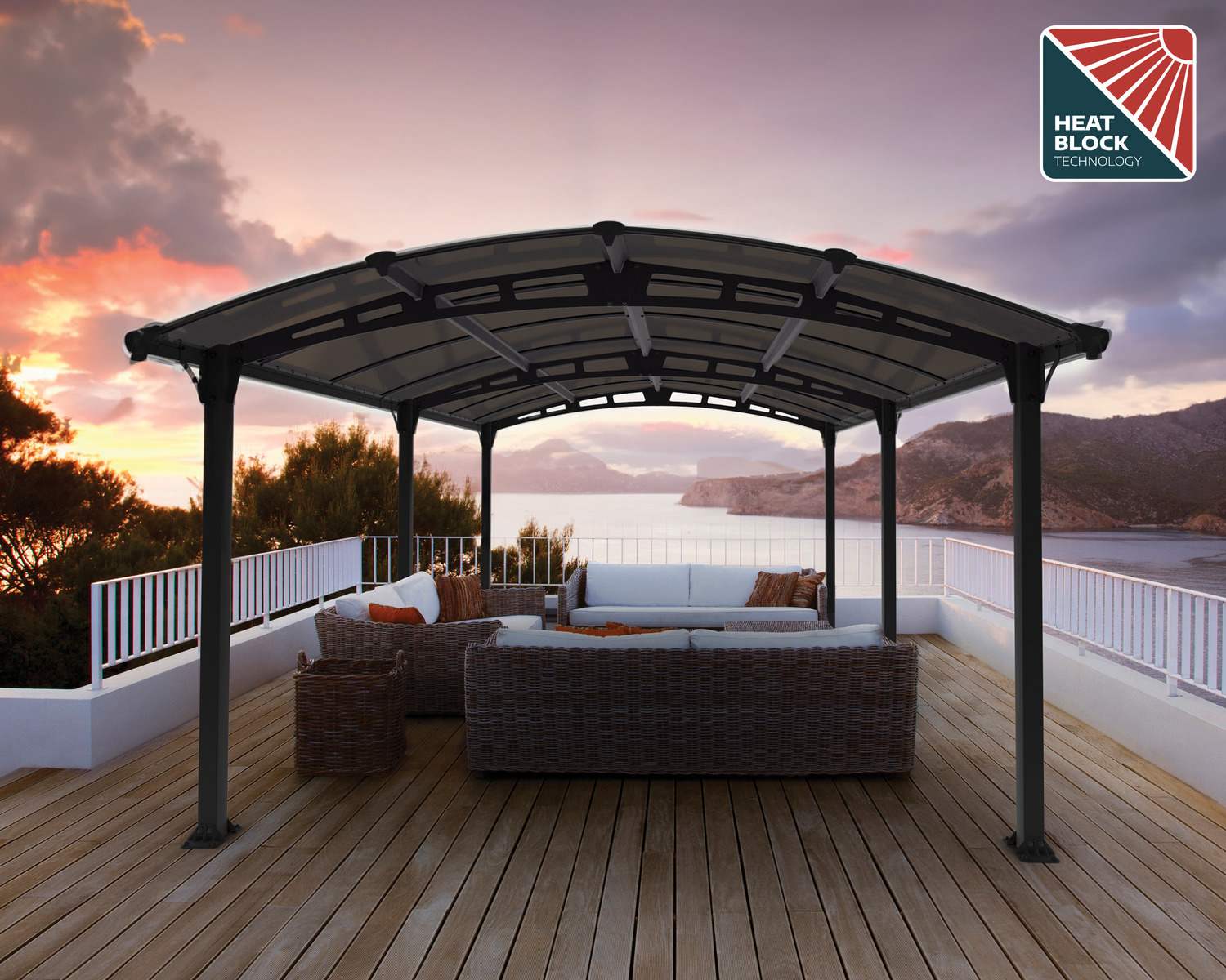 Tucson 12ft x 17ft grey aluminum gazebo on a seaside wooden deck with a sofa and sunset view over the mountains