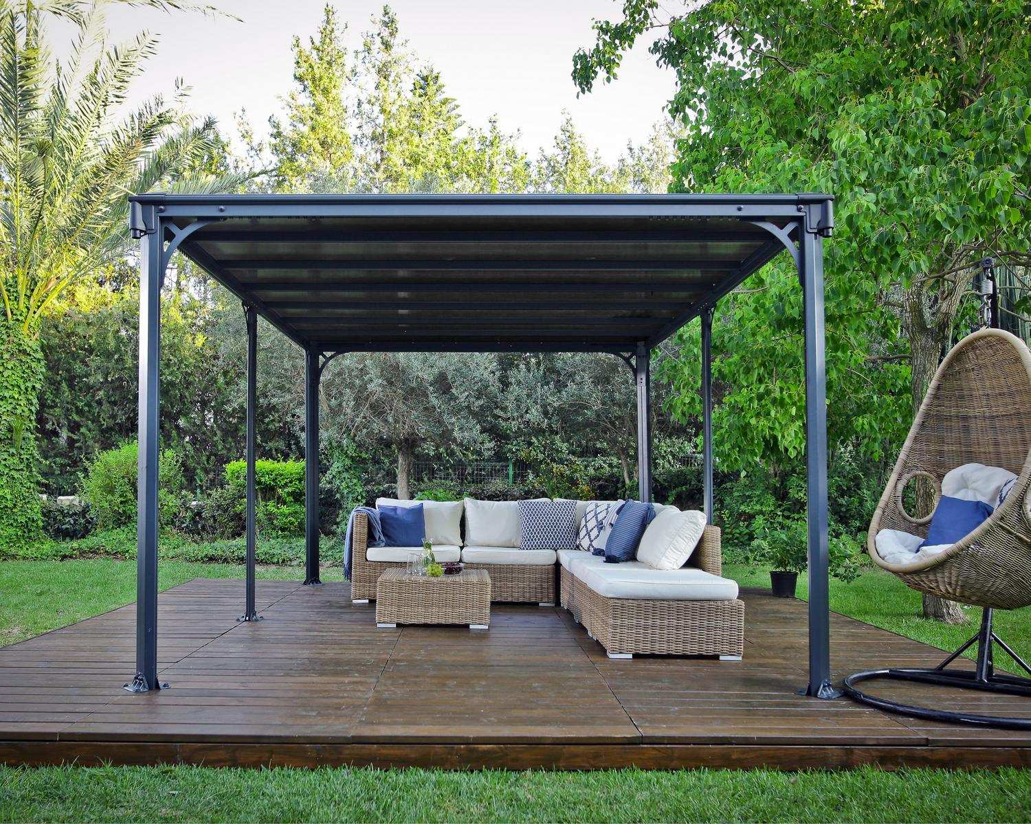 Milano 10ft x 14ft grey aluminum gazebo with a modern design, ideal for an outdoor dining area with string lights on a wooden deck