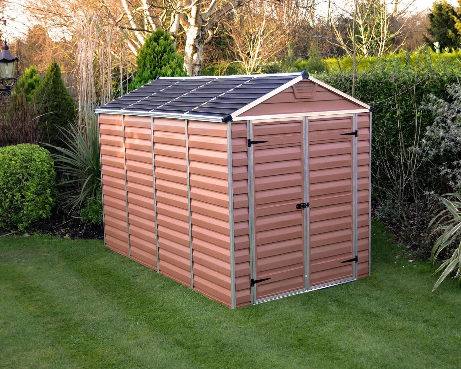 Skylight plastic storag Shed 6 ft x10 ft Amber, showcasing a modern and spacious outdoor storage shed in a backyard setting
