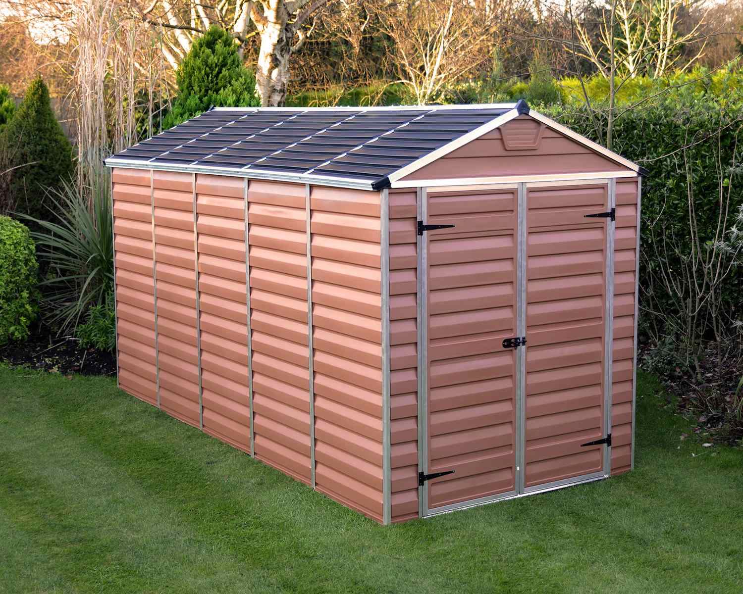 Skylight Plastic Storage Shed 6ft x 12ft in Amber, showcasing a spacious and modern design, set in a backyard environment