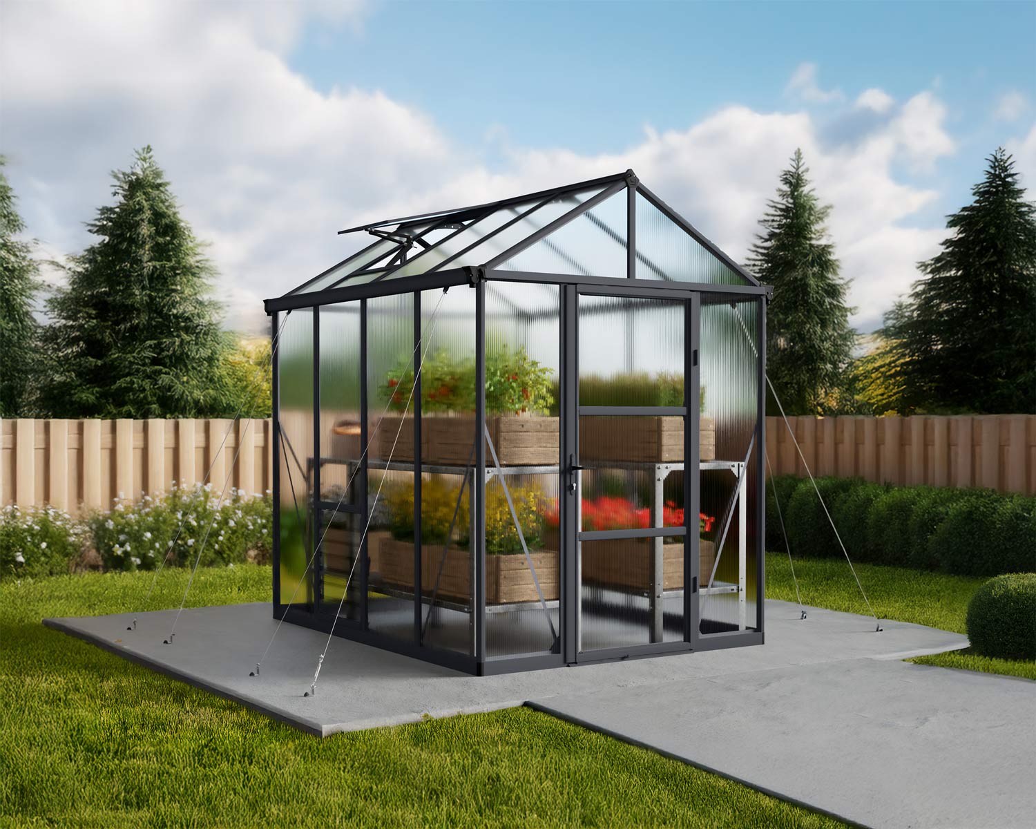 Glory 6x8 Grey greenhouse with polycarbonate multiwall panels, double doors, and a sloped roof, next to a raised garden bed