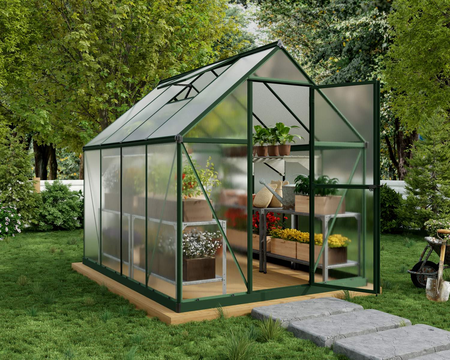 6ft x 8ft green Mythos greenhouse with a durable aluminum frame and clear polycarbonate panels, featuring plant shelves in a lush garden