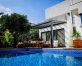 Grey Aluminium Patio Cover With Clear twin-wall polycarbonate roof panels on Beside Pool Patio protect garden furniture