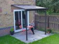 Sierra 7 ft. x 7 ft. grey Patio Cover Patio area with a aluminium pergola