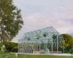Snap &amp; Grow 8 ft. x 24 ft. Greenhouse Silver Structure &amp; Clear Panels on a lawn