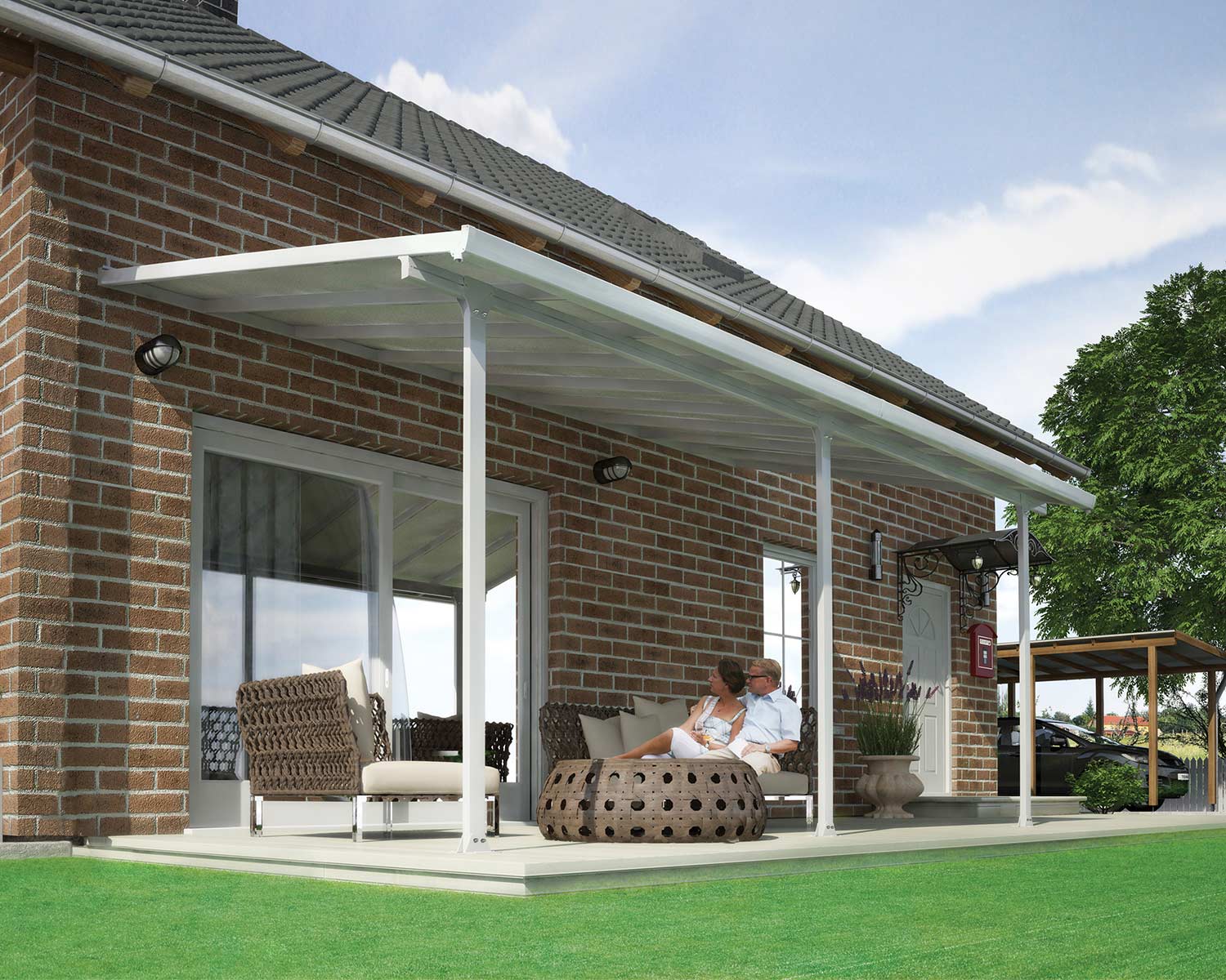 Aluminium White Patio Cover 10 ft. x 18 ft. with polycarbonate roof panels, attached to the house to protect patio furniture