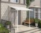 White Aluminium Patio Cover with Clear twin-wall polycarbonate roof panels in front of entry door