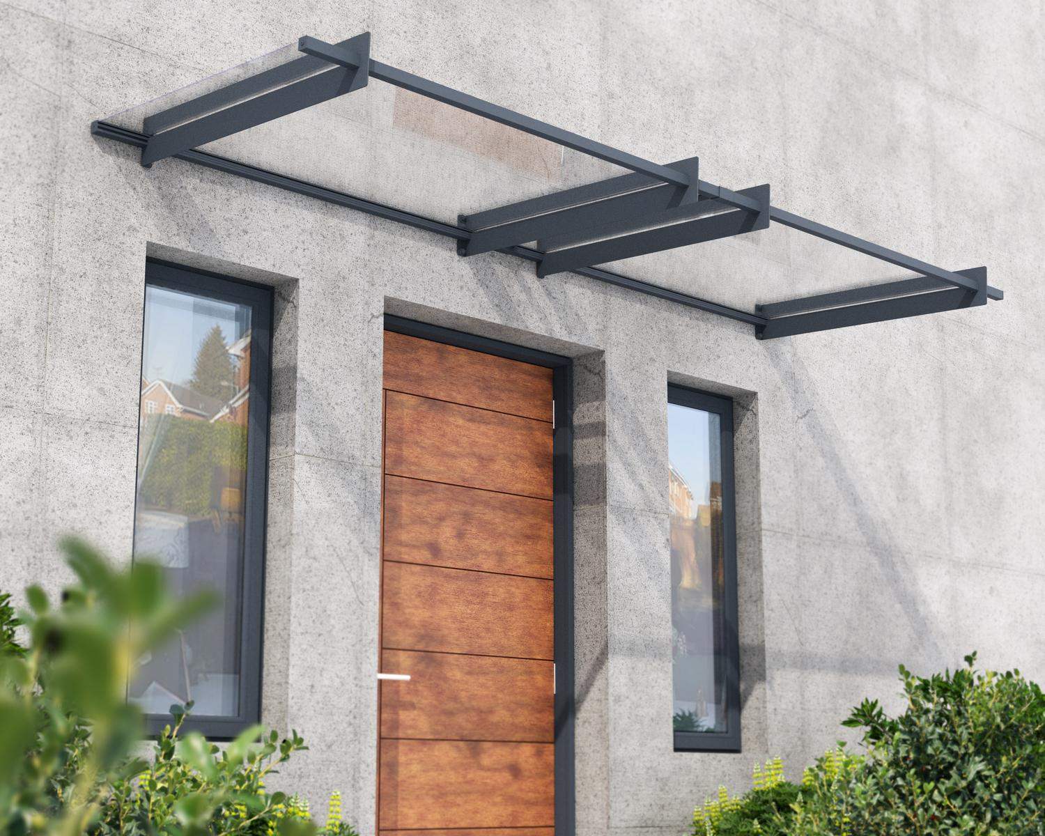 Grey Nancy door awning, 3 ft x 10 ft, showcasing a sleek design with a clear panel, mounted above a doorway