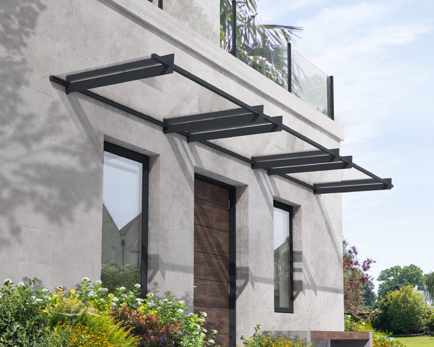 Grey Nancy door awning, 3 ft x 15 ft, showcasing a sleek design with a clear panel, mounted above a doorway