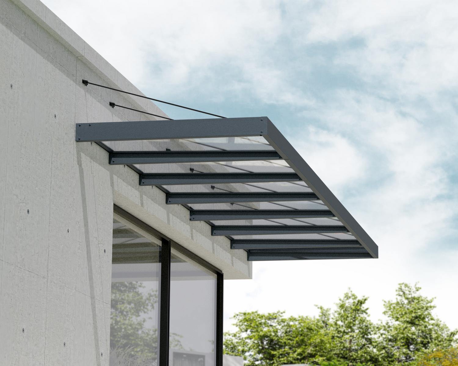 Sophia XL door awning in grey with a clear panel, measuring 5 ft x 22 ft, elegantly positioned above a doorway