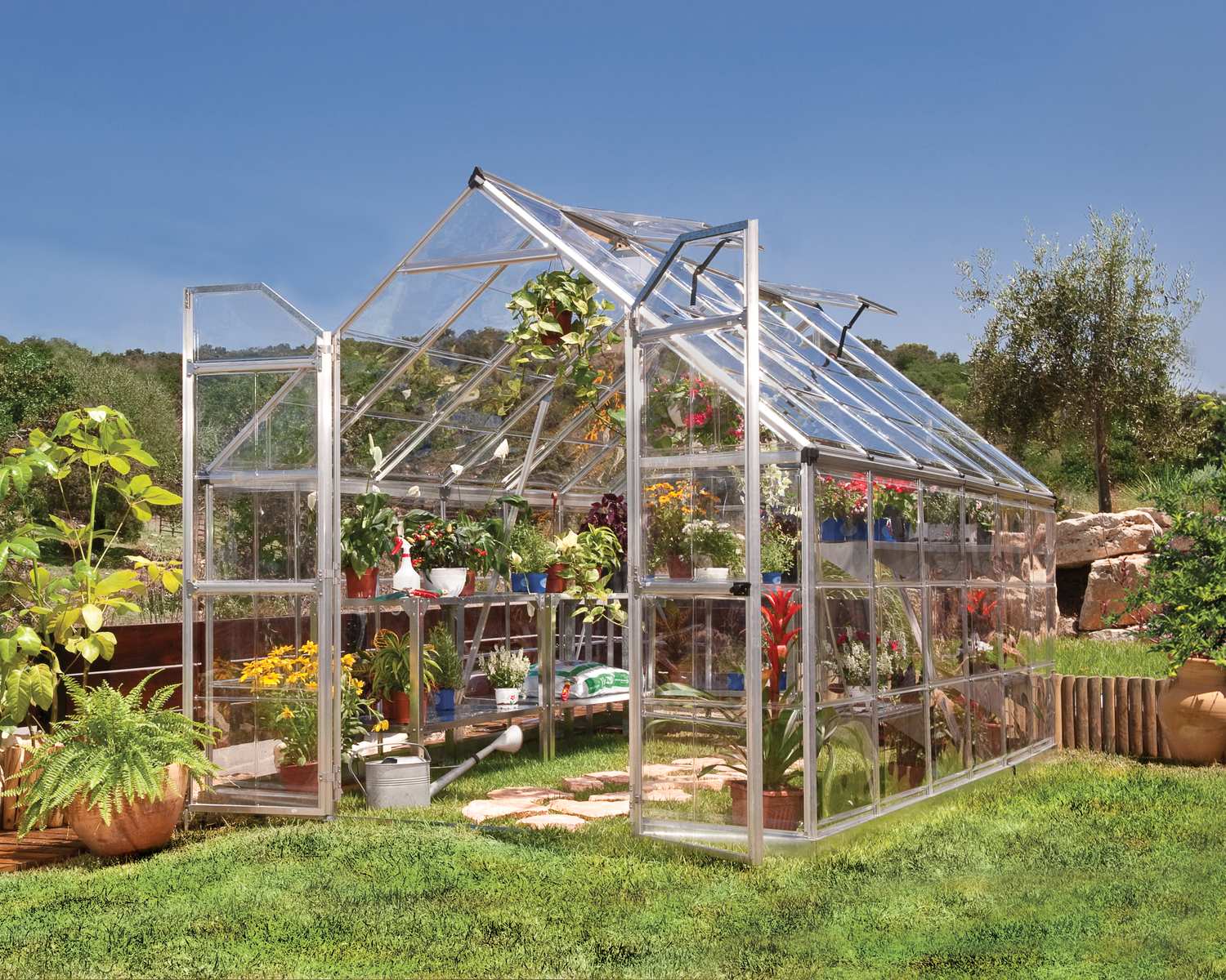 Octave 8ft x 12ft greenhouse with a silver frame and clear polycarbonate panels, designed for durability and optimal light diffusion