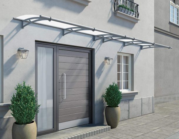 Silver Capella door awning 3 ft x 14 ft with a modern design and frosted panels, mounted above a door