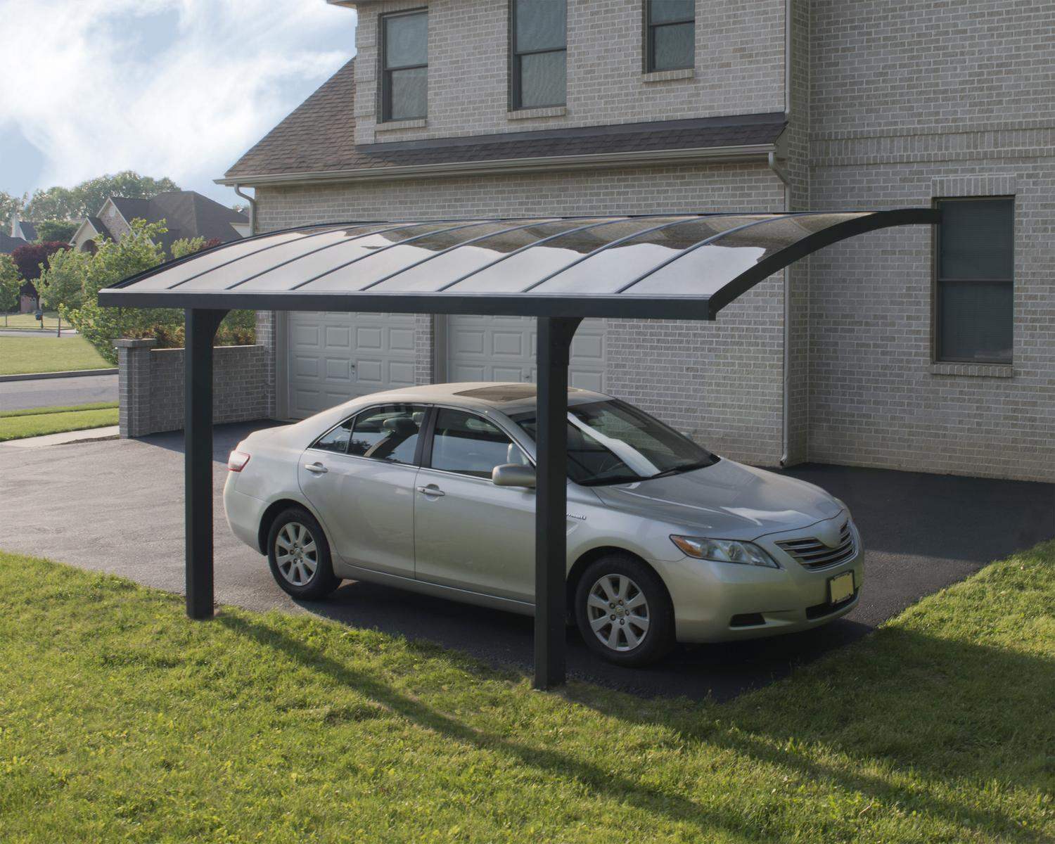 10ft x 16ft Arizona Breeze carport with a grey aluminum frame and durable polycarbonate roof panels, sheltering a white Range Rover
