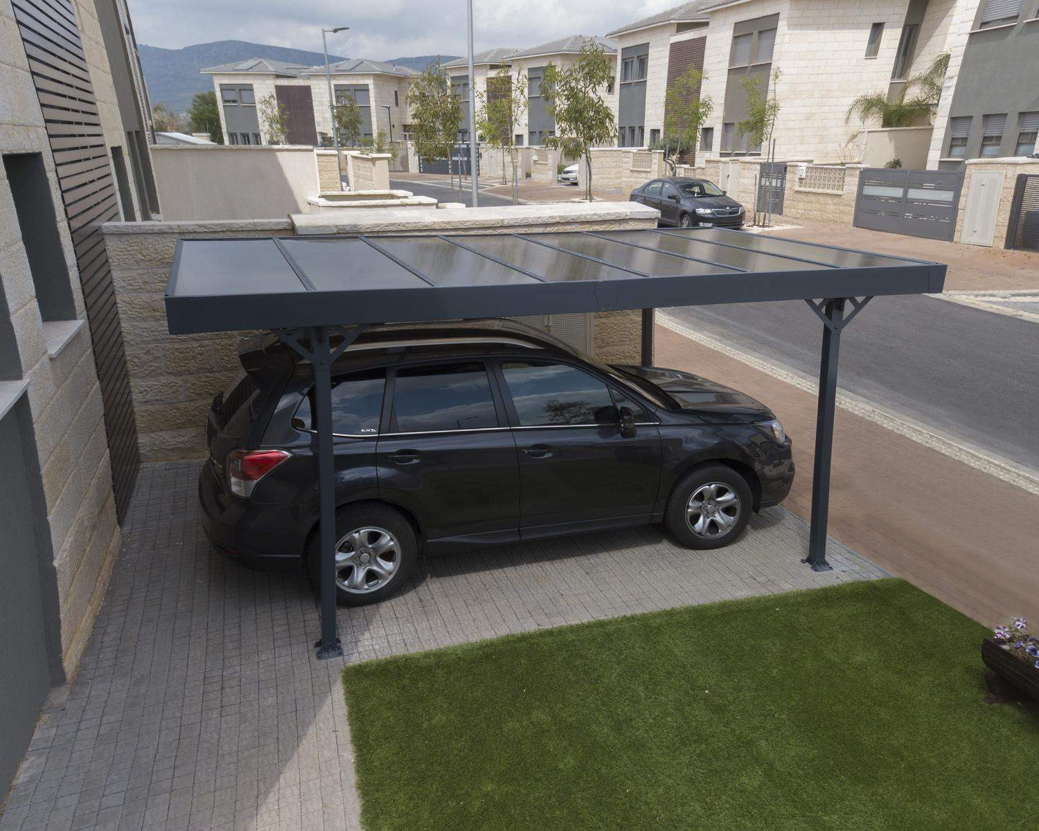 10ft x 16ft grey Palma carport with an aluminium frame and polycarbonate roof, featuring a sleek design, offering protection for a vehicle or outdoor space