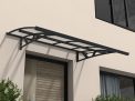 Amsterdam 2.2m x 1.4m grey Door Canopy with clear polycarbonate panels, featuring a modern design for durable protection over entrances