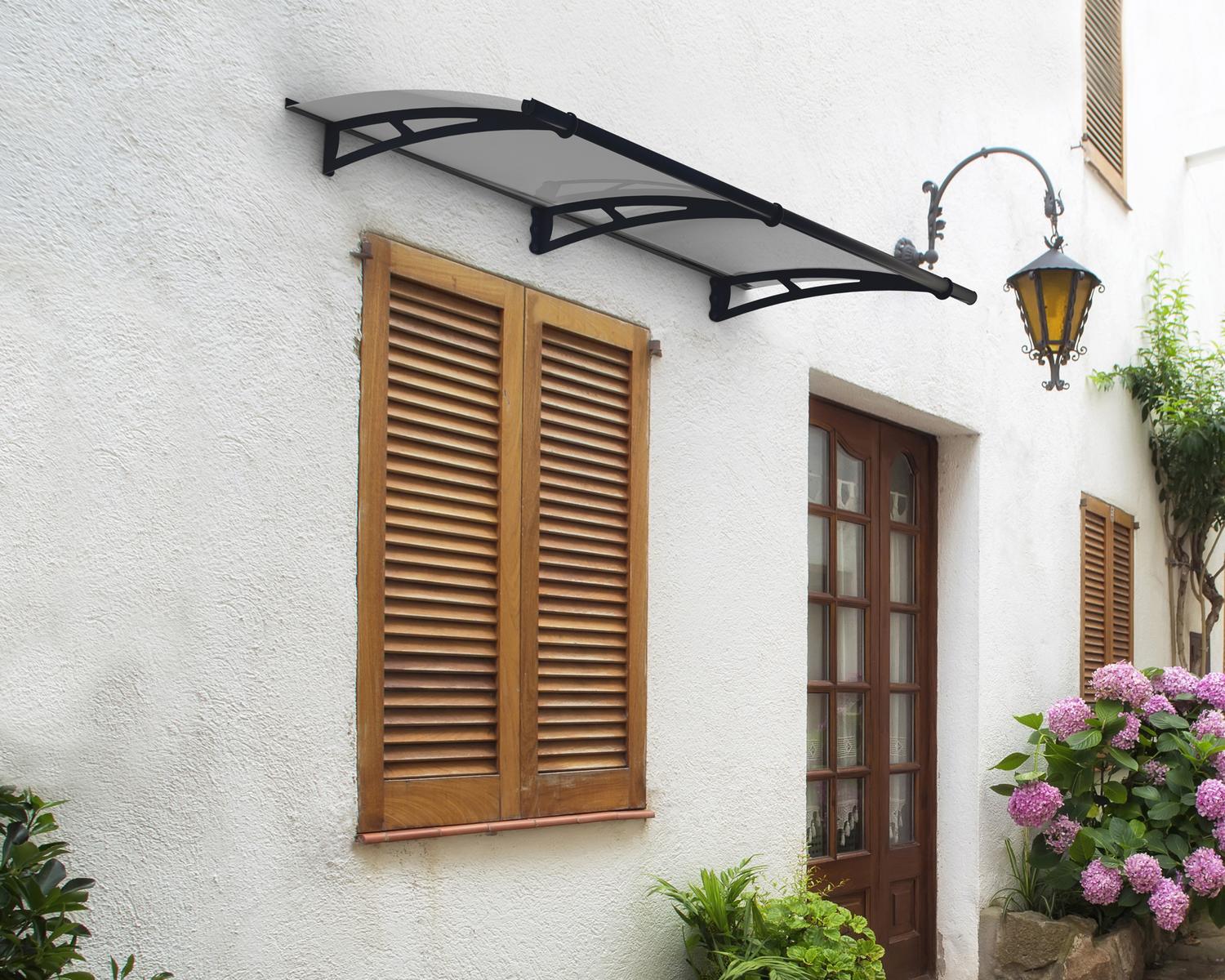Grey Aquila 2m x 0.9m Door Canopy with solar-grey polycarbonate panels, offering sleek and effective protection for doorways