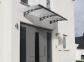 Grey Garamond 2m x 0.9m Door Canopy with clear polycarbonate panels, designed to provide stylish and reliable protection for entrances
