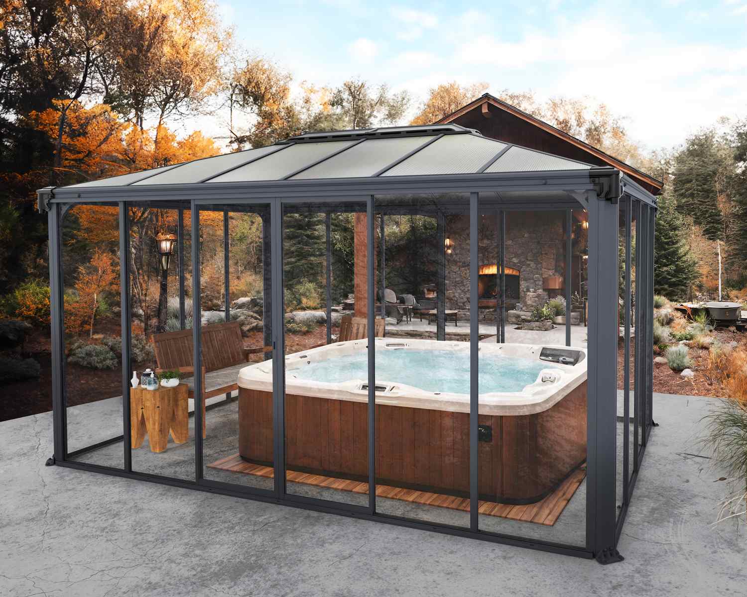 Ledro 3m x 4.3m grey enclosed gazebo with slanted roof, pool table, and surrounding garden at dusk