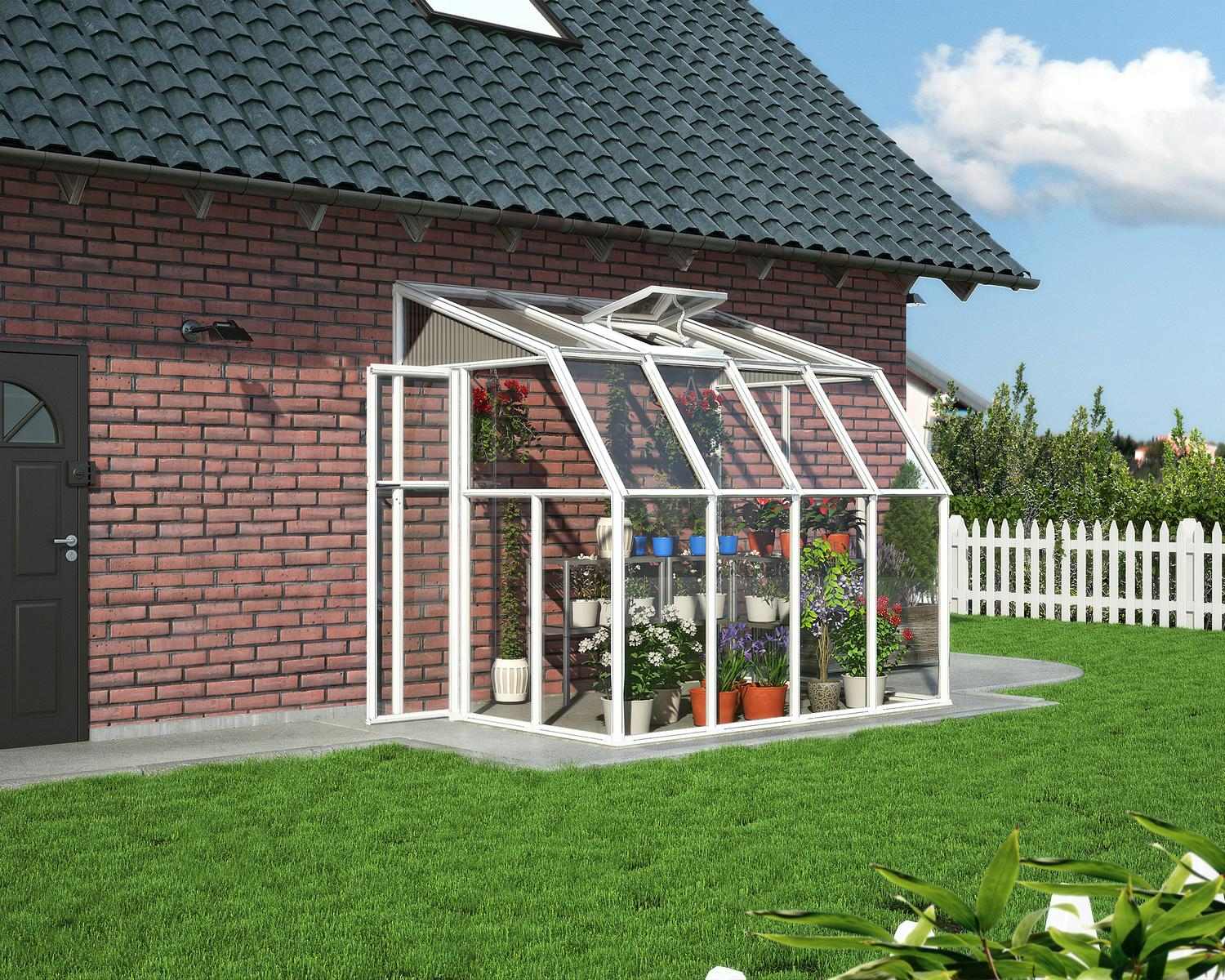 2m x 2.5m white Lean to Conservatory sunroom with clear polycarbonate panels, attached to a red brick house and surrounded by a manicured lawn