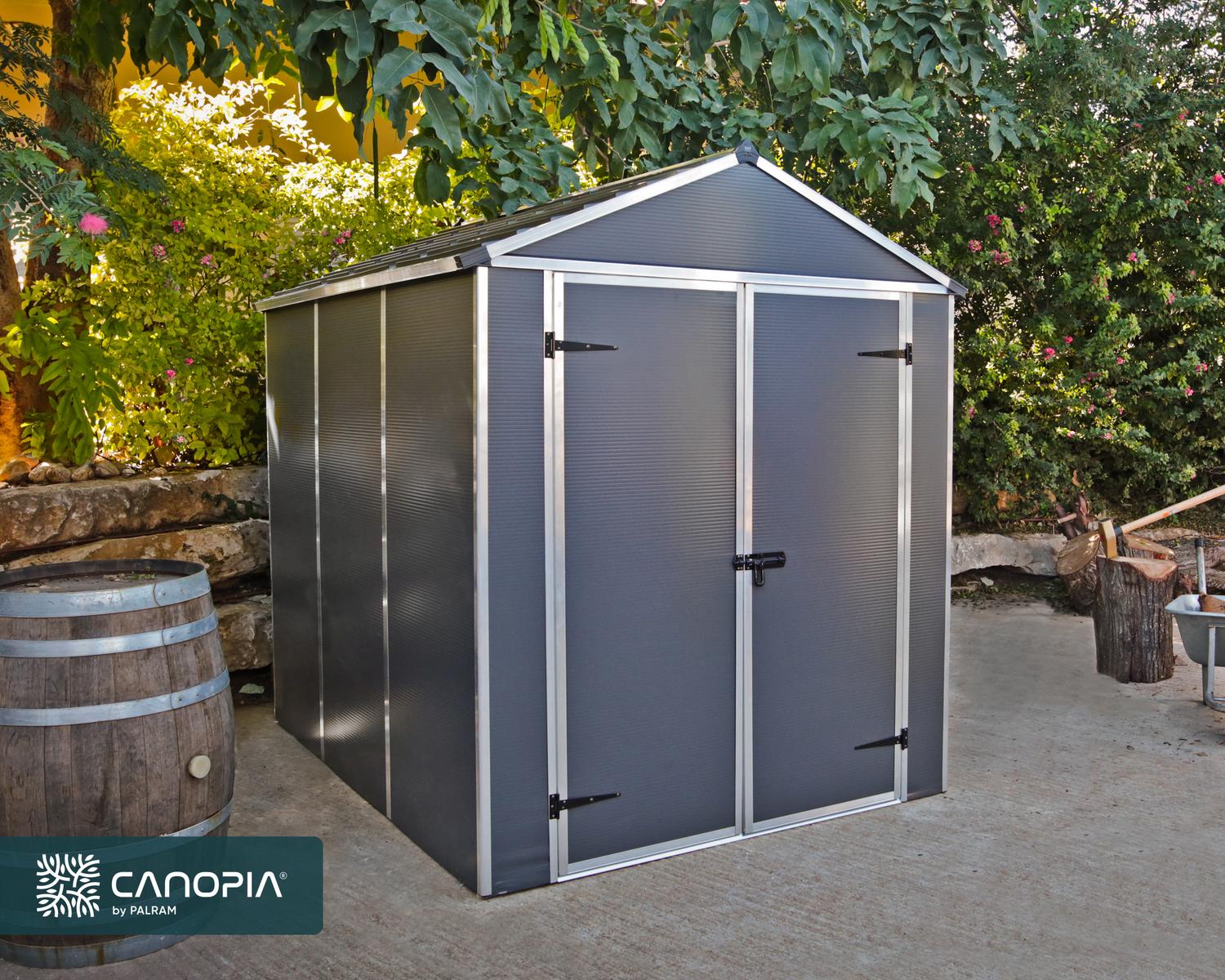 6ft x 8ft grey Rubicon garden shed with a sturdy aluminum frame, multiwall polycarbonate panels, and open doors revealing tools and shelves