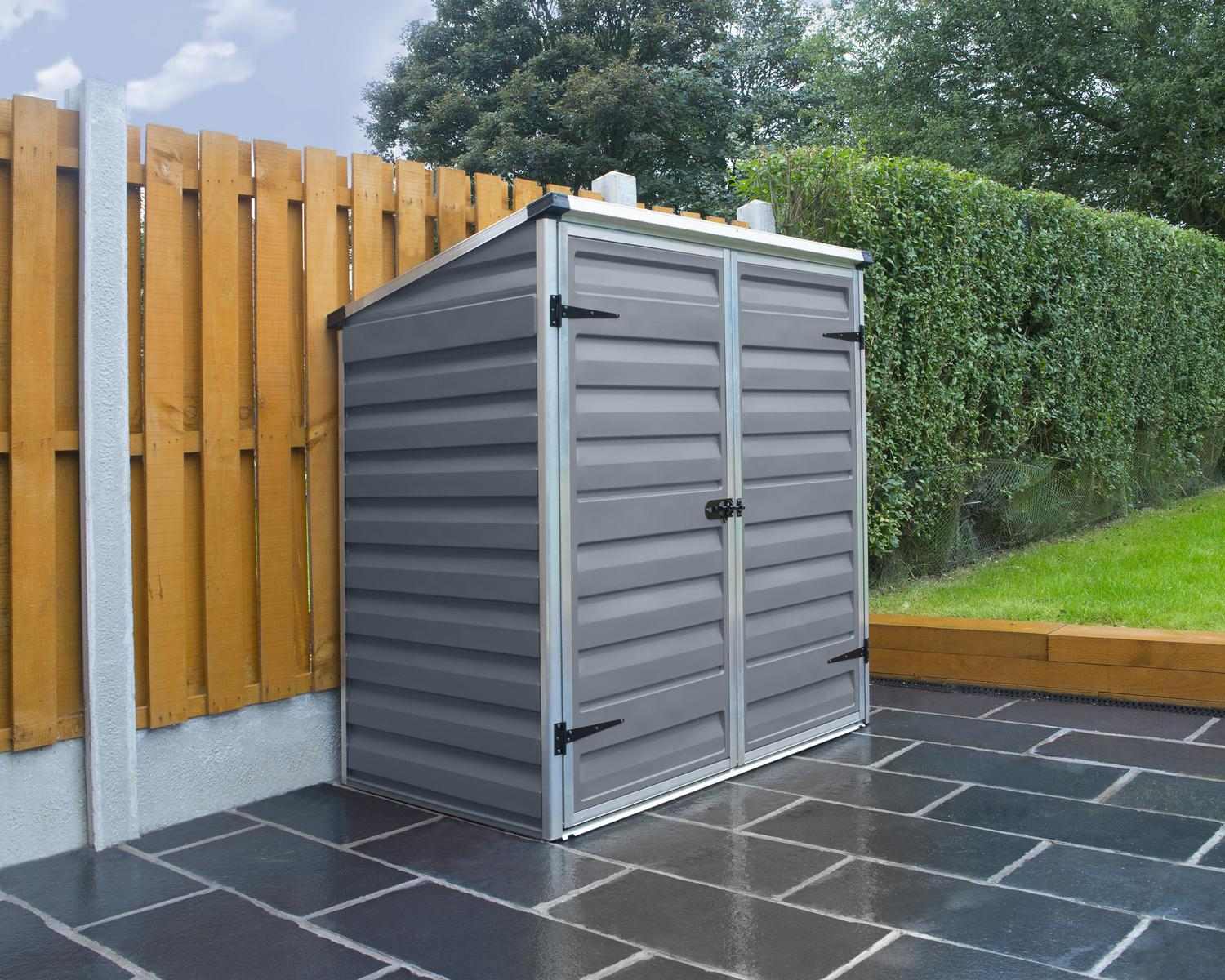 Voyager garden shed in grey, 5ft x 3ft, featuring a robust aluminum frame and polycarbonate panels, placed in a tidy backyard