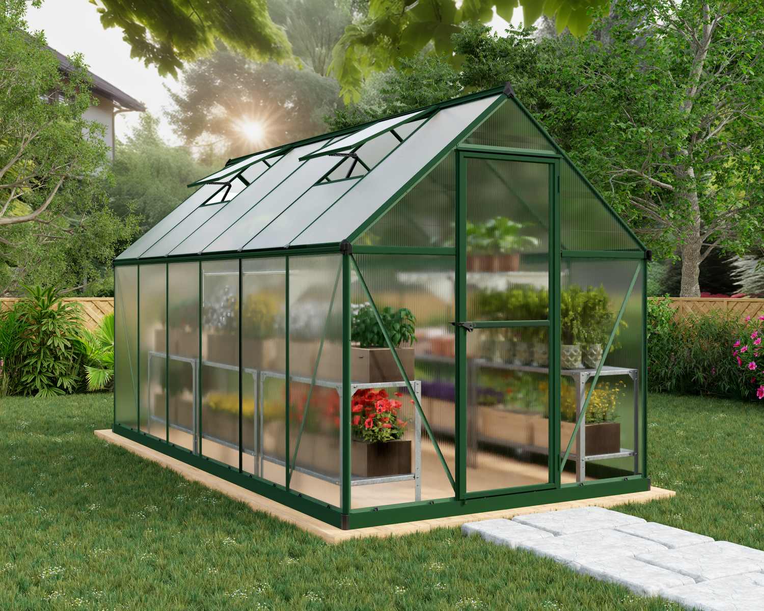 6ft x 12ft green Mythos greenhouse with polycarbonate panels and aluminum frame, set in an outdoor garden space