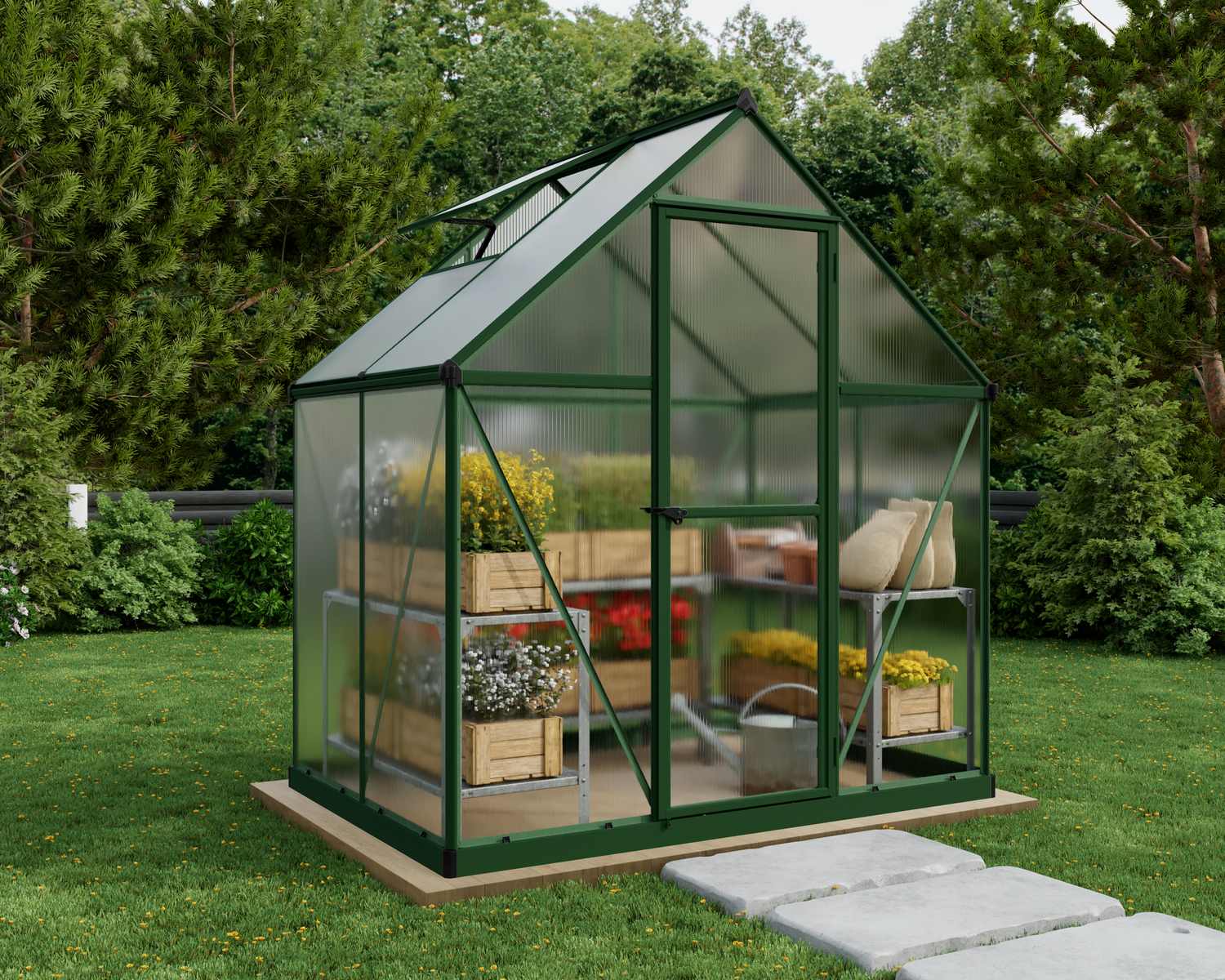6ft x 4ft green Mythos greenhouse with sturdy aluminum framing and clear polycarbonate panels, set in a vibrant garden