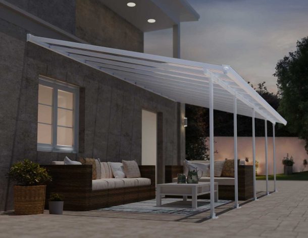 4m x 8m white Feria patio cover with an aluminum frame and clear polycarbonate panels for outdoor weather protection