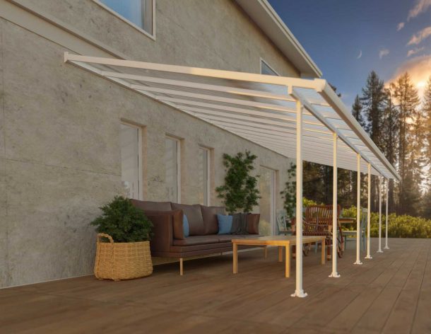 White Feria patio cover, 4m x 8.5m, with an aluminum frame and clear polycarbonate panels, providing shade and protection for large outdoor areas