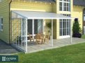 White 4m x 6m Feria patio cover with a sidewall, aluminum frame, and clear polycarbonate panels for weather protection and privacy