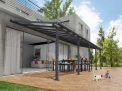 Grey Olympia patio cover, 3m x 9.8m, with an aluminum frame and clear polycarbonate panels for outdoor shade and protection