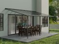 Grey Sierra patio cover, 3m x 5.6m, with an aluminum frame and clear polycarbonate panels for effective shade and protection