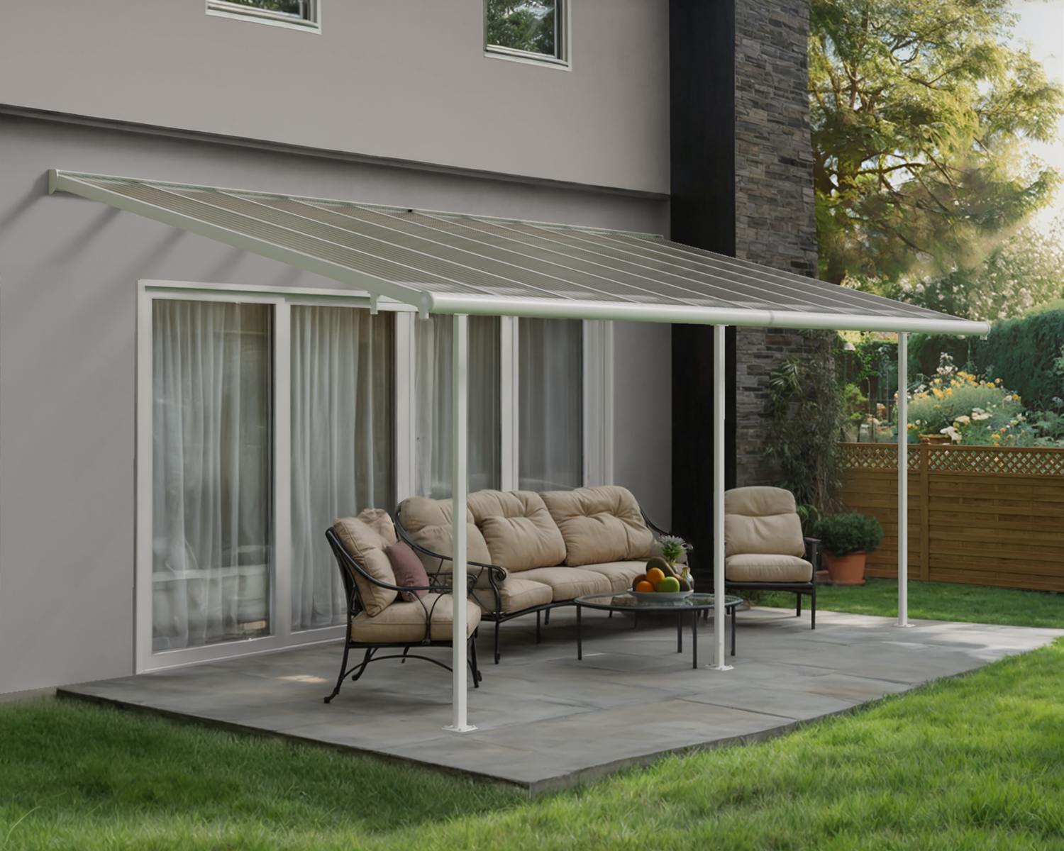 White Sierra patio cover, 3m x 6.2m, with an aluminum frame and clear polycarbonate panels, offering weather protection for outdoor areas