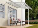 White Sierra patio cover, 2.2m x 2.3m, with an aluminum frame and clear polycarbonate panels, offering shade and weather protection