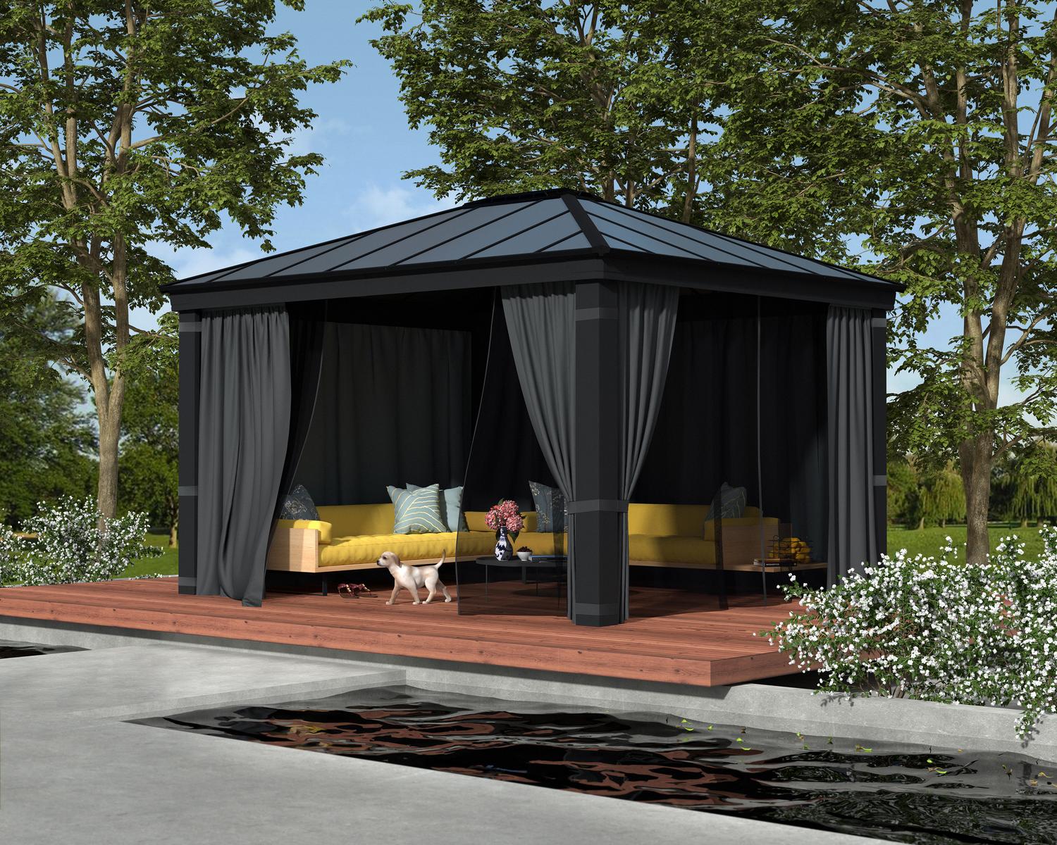 Grey Dallas 2.6m x 4.3m garden gazebo with polycarbonate roof and HeatBlock technology, with deck furniture by a pool and tall cypress trees