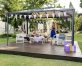 Family time on a deck patio under a 10'x14' aluminum gazebo with polycarbonate roof panels