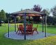 Hexagon gazebo on garden patio with dining furniture