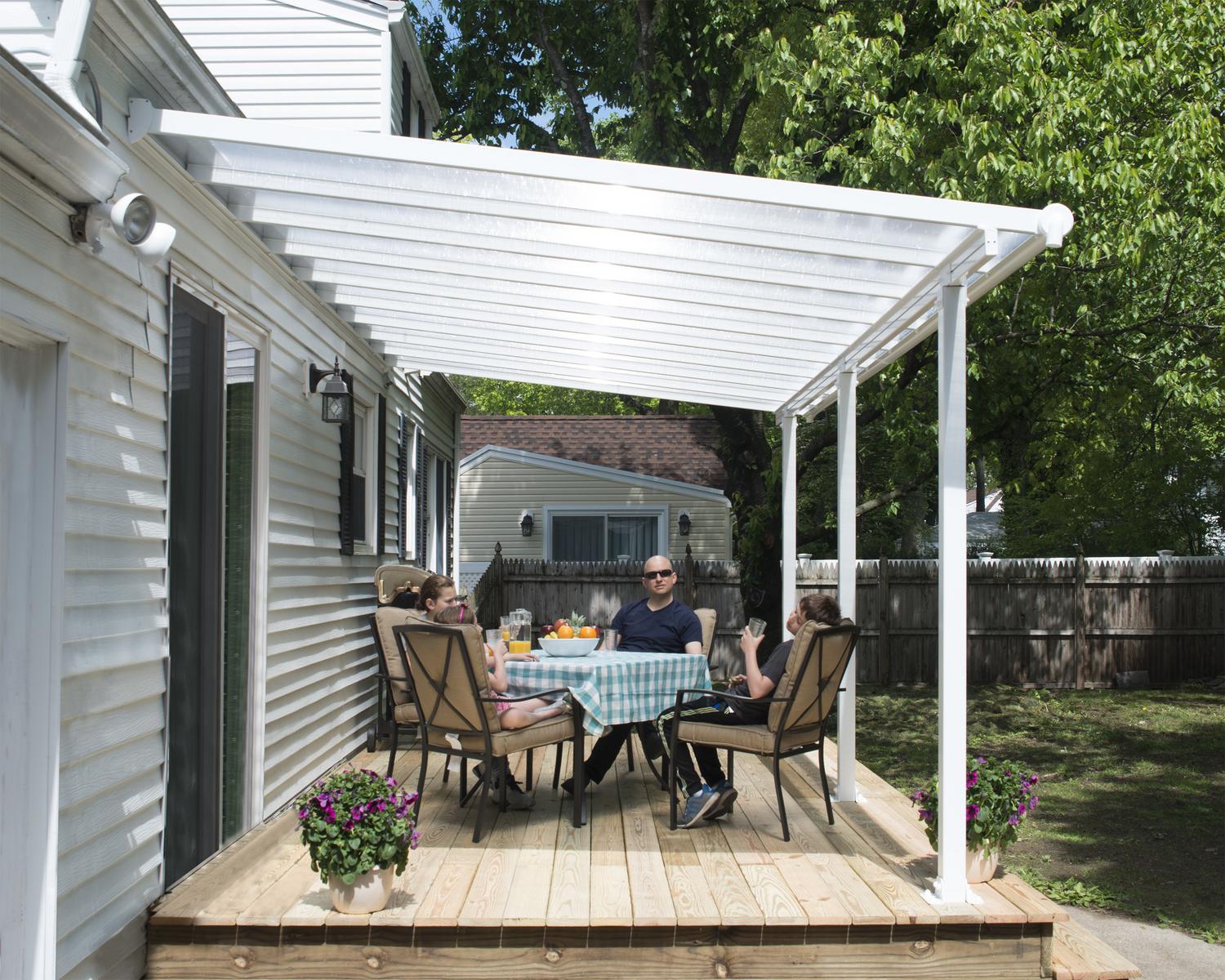 White Olympia patio cover, 3m x 5.5m, with an aluminum frame and clear polycarbonate panels for outdoor shade and weather protection