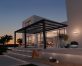 Grey Stockholm patio cover, 3.4m x 6m, featuring an aluminum frame and clear polycarbonate panels for durable outdoor weather protection
