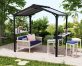 Outdoor grill station under an Austin 1.8m x 2.4m black aluminium garden gazebo with a polycarbonate roof