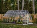 10ft x 16ft silver Balance greenhouse with an aluminum frame and clear polycarbonate panels, set in a garden environment with plants inside