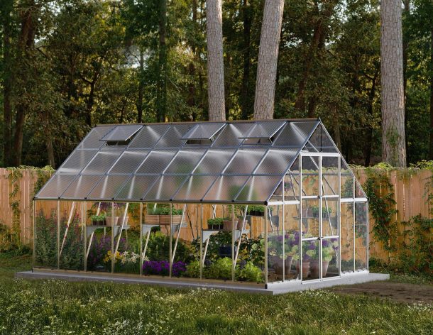 10ft x 16ft silver Balance greenhouse with an aluminum frame and clear polycarbonate panels, set in a garden environment with plants inside