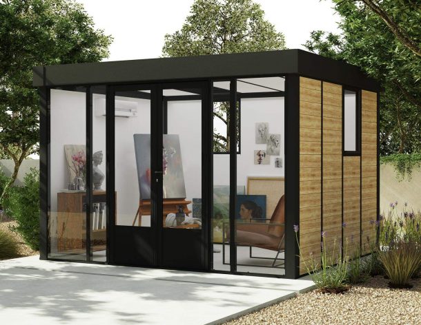 Stylish Copenhagen 3m x 3.5m black Lean to Conservatory with an aluminum frame and clear polycarbonate panels, set in a serene garden at sunset
