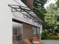 Amsterdam 8.9m x 1.4m grey Door Canopy with clear polycarbonate panels, combining modern aesthetics with durable protection