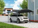10ft x 17ft Vitoria carport with a grey aluminum frame and polycarbonate roof, offering stylish protection for vehicles