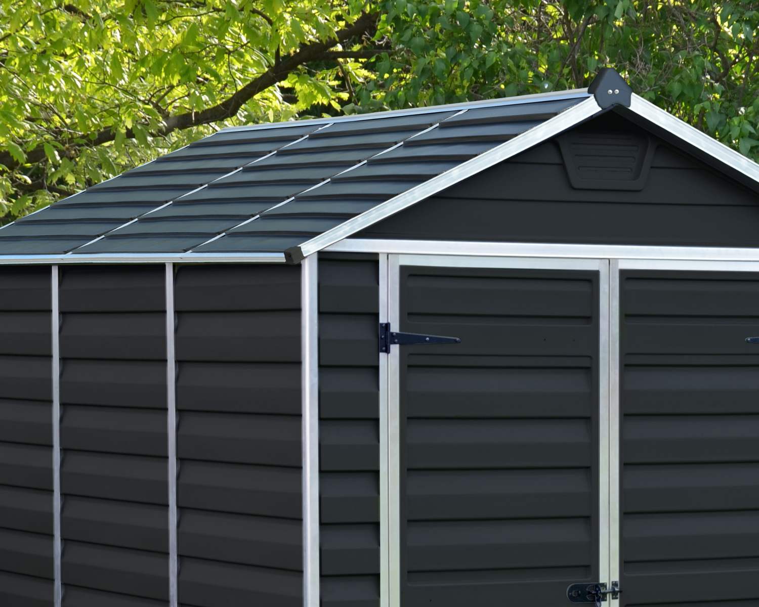 Skylight 6ft x 5ft Midnight grey garden shed with a durable aluminum frame and polycarbonate panels, offering stylish and reliable outdoor storage